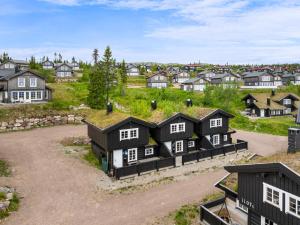 an aerial view of a village with houses at Trysilfjell Nord 1105C - by Vacation Trysil in Trysil