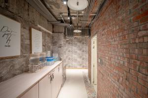 Köök või kööginurk majutusasutuses 慶爾喜旅館長沙館Cheers Loft Self Check-in Hotel +37 fotot