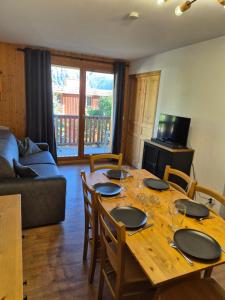 Et opholdsområde på vacance familiale à la montagne + 1 billede