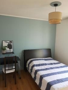 Ένα ή περισσότερα κρεβάτια σε δωμάτιο στο Chambre dans beau T3 très proche centre ville !