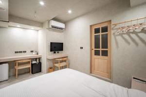Köök või kööginurk majutusasutuses 慶爾喜旅館長沙館Cheers Loft Self Check-in Hotel