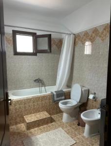 Et badeværelse på Olympus Moments + 9 billeder