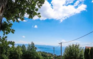 a view of a blue sky with clouds and trees at 2 Bedroom Nice Home In Veprinac in Veprinac +18 photos