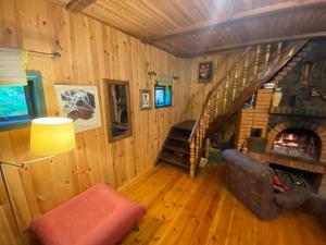 TV a/nebo společenská místnost v ubytování Summerhouse Labanoras