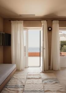 Μια τηλεόραση ή/και κέντρο ψυχαγωγίας στο Aragosta Suites