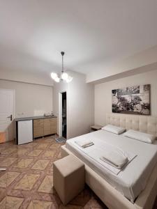 Postel nebo postele na pokoji v ubytování Margarita Guesthouse