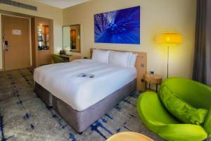 Ένα ή περισσότερα κρεβάτια σε δωμάτιο στο Hotel Rakesh