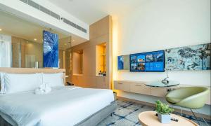 Ένα ή περισσότερα κρεβάτια σε δωμάτιο στο Hotel Rakesh