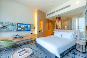 Ένα ή περισσότερα κρεβάτια σε δωμάτιο στο Hotel Rakesh