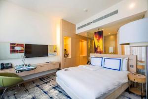 Μια τηλεόραση ή/και κέντρο ψυχαγωγίας στο Hotel Rakesh