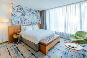 Ένα ή περισσότερα κρεβάτια σε δωμάτιο στο Hotel Rakesh