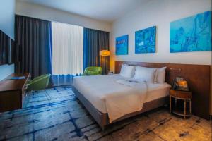 Ένα ή περισσότερα κρεβάτια σε δωμάτιο στο Hotel Rakesh