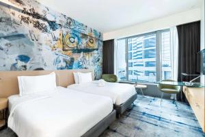 Ένα ή περισσότερα κρεβάτια σε δωμάτιο στο Hotel Rakesh