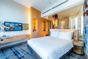 Ένα ή περισσότερα κρεβάτια σε δωμάτιο στο Hotel Rakesh