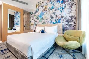 Ένα ή περισσότερα κρεβάτια σε δωμάτιο στο Hotel Rakesh