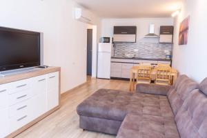 Kuchyňa alebo kuchynka v ubytovaní Seaforth Apartment + 37 fotografií