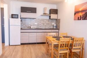 Kuchyňa alebo kuchynka v ubytovaní Seaforth Apartment