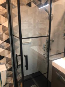 Ένα μπάνιο στο Au calme, 100m plage Écluse, balcon, box garage, Wifi