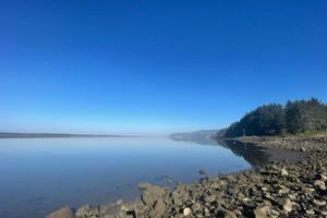 a view of the shoreline of a lake at Bungalow by the Bay in Netarts