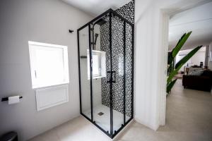 Koupelna v ubytování Mariarita's Suites + 20 fotografií
