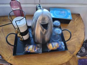 a table with a blender on top of a table at VILLA DE SOUZA in Bouillé-Loretz