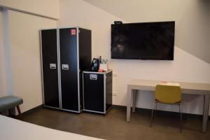 Sjónvarps- og/eða afþreyingartæki á Radisson RED Miraflores