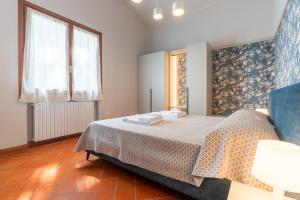 A bed or beds in a room at Villa Selva
