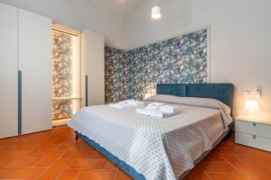 A bed or beds in a room at Villa Selva