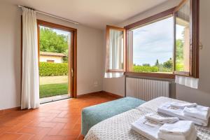 A bed or beds in a room at Villa Selva