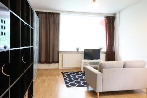 Μια τηλεόραση ή/και κέντρο ψυχαγωγίας στο Convenient Apartment for 2