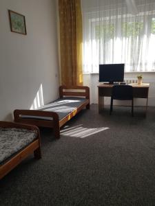 Ένα ή περισσότερα κρεβάτια σε δωμάτιο στο mHostel24