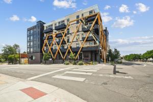 a large building on the corner of a street at Southwestern Charm | Espadin LoHi in Denver