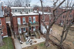 an aerial view of a building with stairs on it at The Journey Home | JZ Vacation Rentals in Soulard