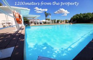 a view of a swimming pool with the words meters from the property at Casa Donnalby in Monopoli