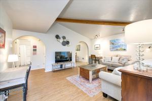 a living room with a couch and a table at Norton's River Crossing in Boise