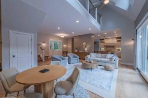 a living room with a couch and a table at Sycamore Ranch in Templeton