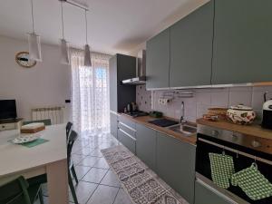 Cucina o angolo cottura di La Terrazza HOUSE