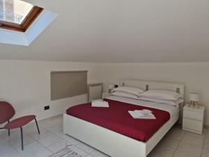 Letto o letti in una camera di La Terrazza HOUSE