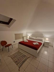 Letto o letti in una camera di La Terrazza HOUSE