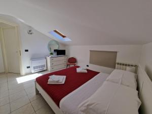 Letto o letti in una camera di La Terrazza HOUSE