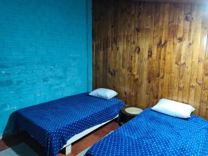 Cabaña los teros客房内的一张或多张床位