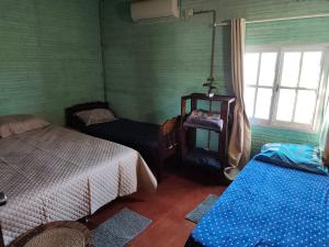 Cabaña los teros客房内的一张或多张床位