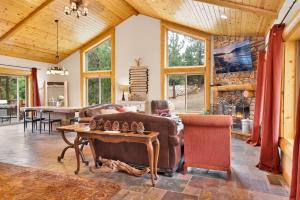 a living room with a couch and a table at Eagle ridge views #1648 in Big Bear Lake