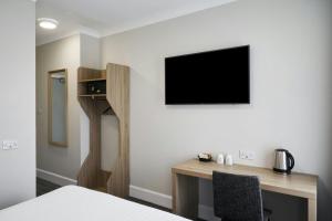 TV a/nebo společenská místnost v ubytování Four Points Flex by Sheraton Edinburgh