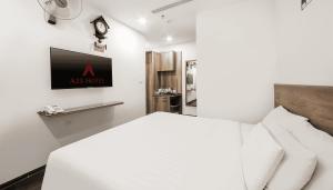 TV a/nebo společenská místnost v ubytování A25 Hotel - Hoàng Đạo Thúy 1