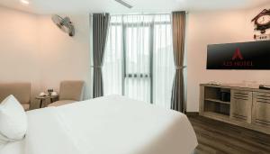 TV a/nebo společenská místnost v ubytování A25 Hotel - Hoàng Đạo Thúy 1