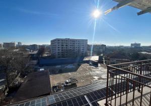 a view of a building under construction in a city at Alexandru Apartment in Bucharest