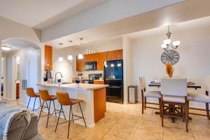 a kitchen and dining room with a table and chairs at Southern #2068 Mesa in Mesa