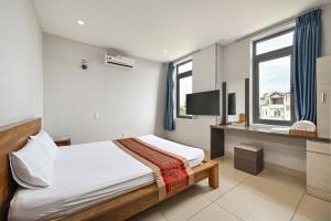 Imagem da galeria de Gio Hotel - near Nam Saigon International Hospital em Cidade de Ho Chi Minh