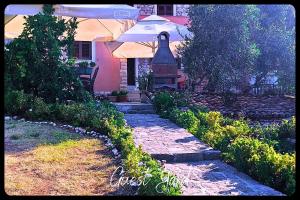 Κήπος έξω από το Apartments Rosa +32 φωτογραφίες